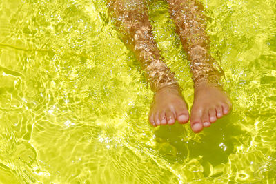 Woman swimming in sea