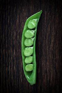 High angle view of green chili on table