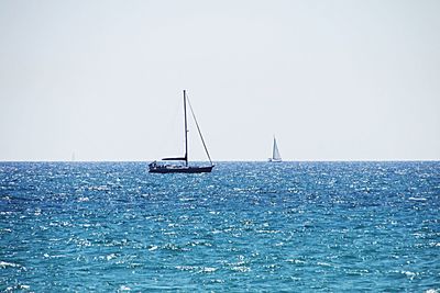 Boats sailing in sea