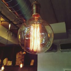 Light bulb hanging from ceiling