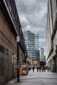 Modern buildings in city against sky