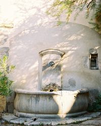 View of fountain against wall