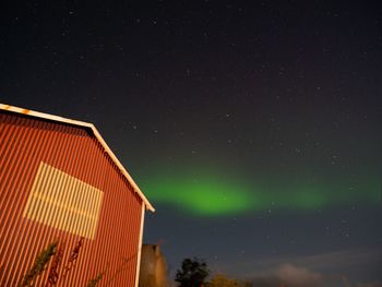 Low angle view of building against sky at night