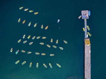 High angle view of painting on wall by swimming pool