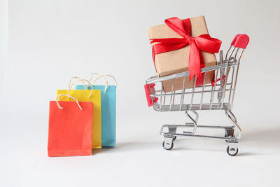 Close-up of christmas presents against white background