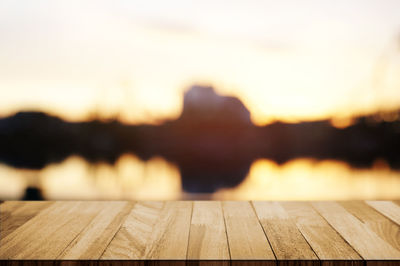Close-up of pier against sky during sunset