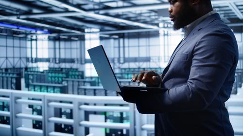 Young man using digital tablet
