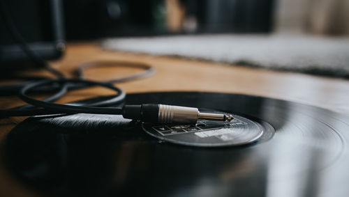 Close-up of camera on table