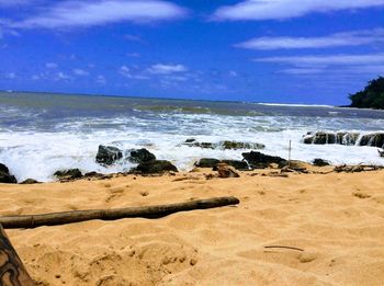 Scenic view of beach against sky