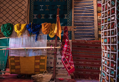 Clothes hanging on rack for sale at market