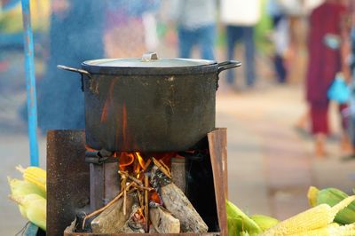 View of food cooking on fire