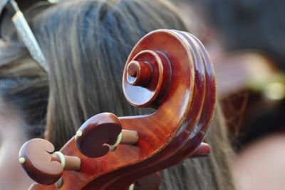 Close-up of person playing guitar
