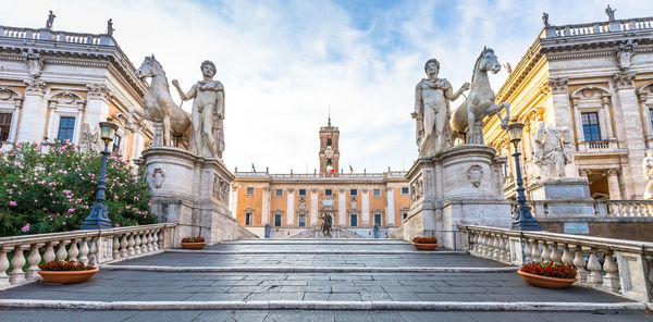 Statue of historic building against sky