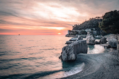 Scenic view of sea against sky during sunset