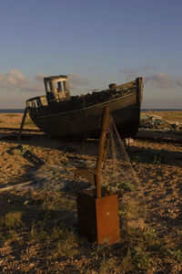 Built structure on field at sunset