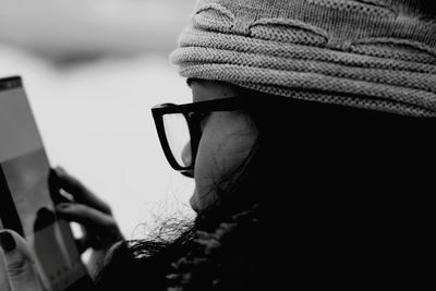 Close-up of man using mobile phone