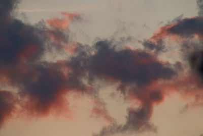 Low angle view of dramatic sky during sunset