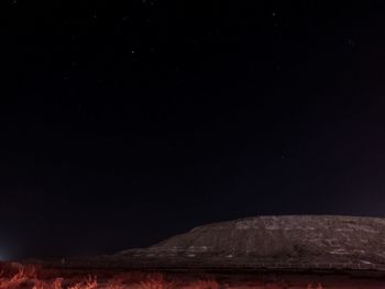 Scenic view of star field against clear sky at night