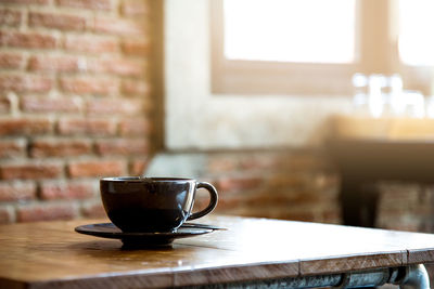 Coffee cup on table