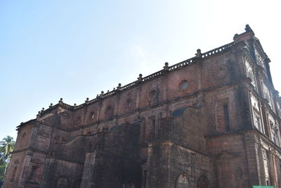 Low angle view of old building against sky