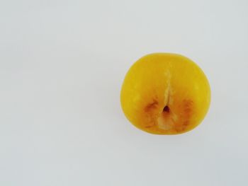 Close-up of fruit on white background