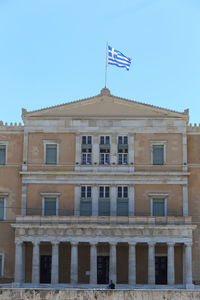 Low angle view of building against blue sky