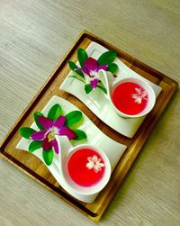 High angle view of flowers in bowl on table