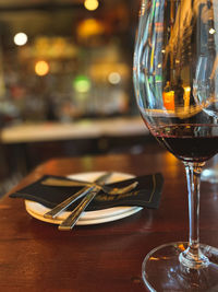 Glass of red wine on a table, restaurant, bar