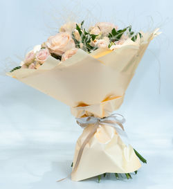 Close-up of white rose on table