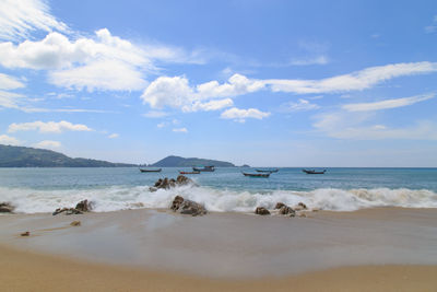 Scenic view of beach against sky