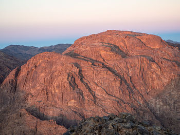 Scenic view of rocky mountains against sky