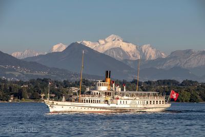 Scenic view of sea against mountains