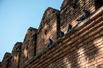 Low angle view of building against clear sky