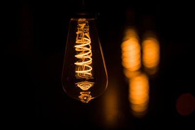 Close-up of illuminated light bulb