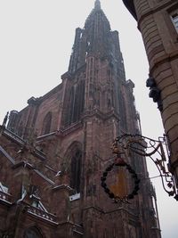 Low angle view of bell tower against clear sky