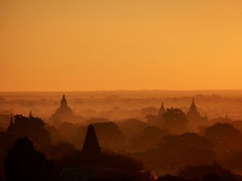 Silhouette of temples during sunset