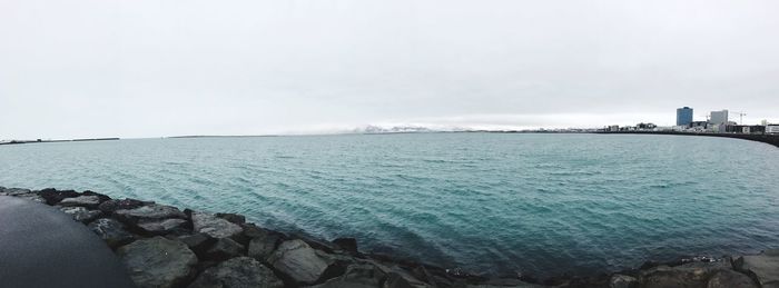 Scenic view of sea against clear sky