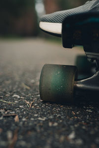 Closeup of skateboard wheel on street