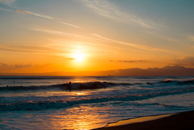 Scenic view of sea against sky during sunset