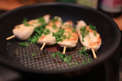 High angle view of meat in cooking pan