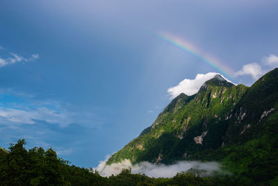 Low angle view of rainbow against sky