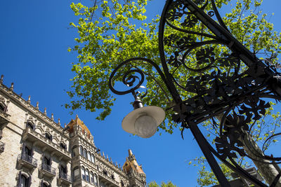 Low angle view of historical building against blue sky