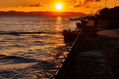 Scenic view of sea against sky during sunset