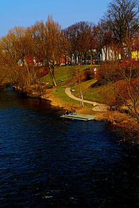 Scenic view of lake in park during autumn