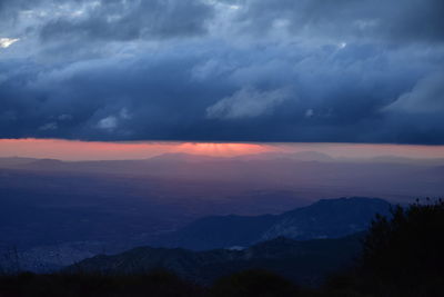 Scenic view of dramatic sky during sunset