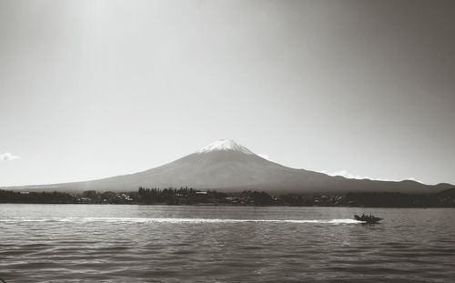 View of sea with mountain in background