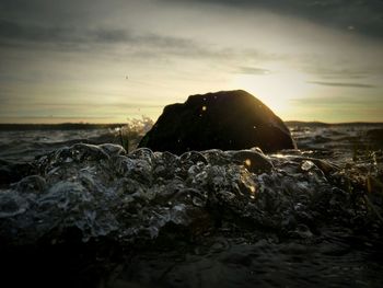 Scenic view of sea at sunset