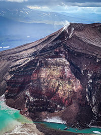 Aerial view of rock formations in sea