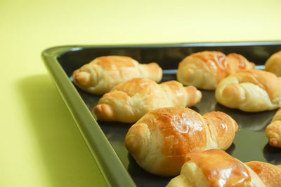 Close-up of sausages in container