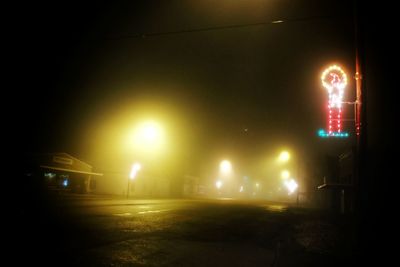 Illuminated street light at night